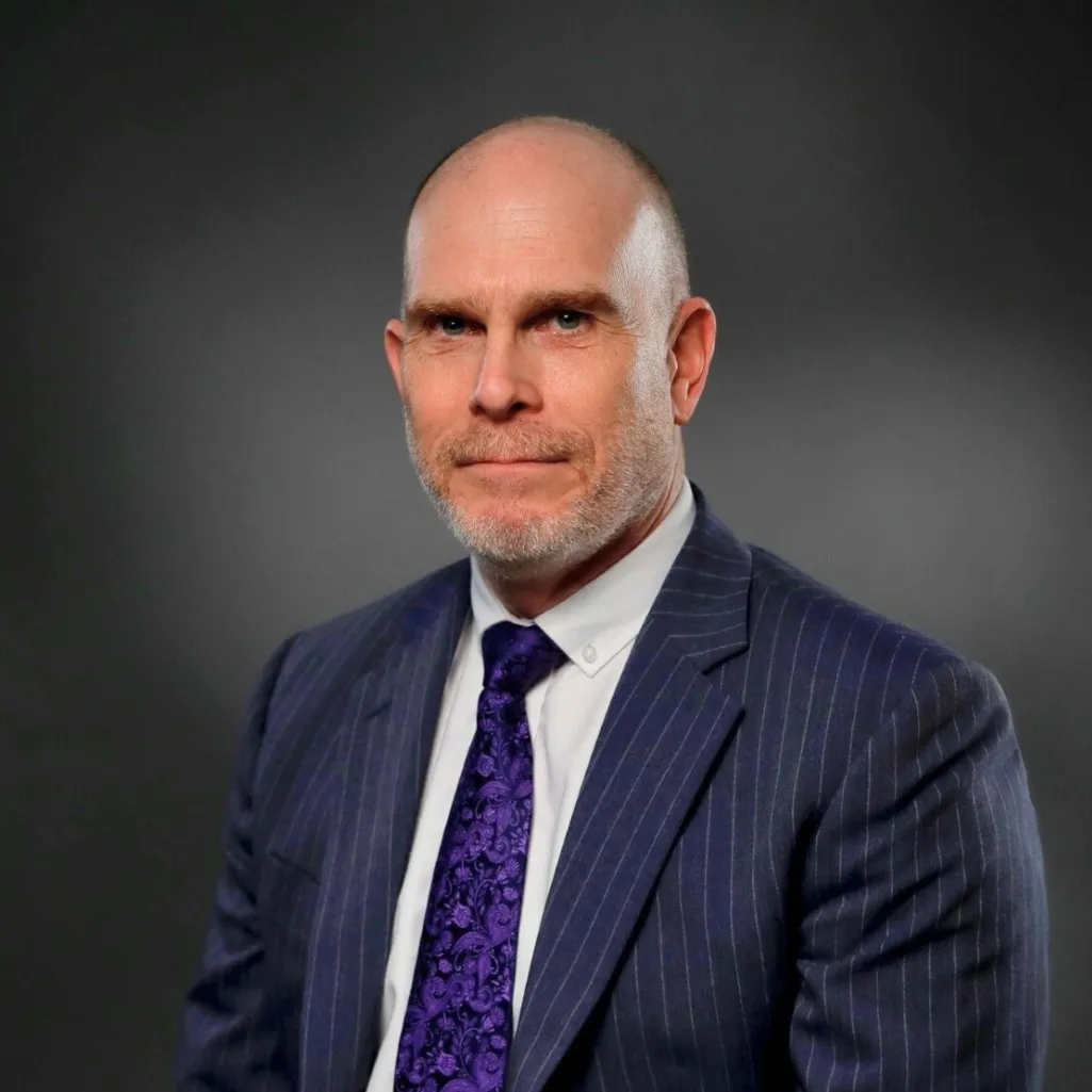 Headshot of Ric Elkington